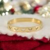 Hearts Aglow Bracelet – Gold Band with Crystal Heart Accents